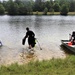Fort McCoy biologists go diving to curb invasive plant species