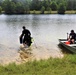 Fort McCoy biologists go diving to curb invasive plant species