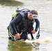 Fort McCoy biologists go diving to curb invasive plant species