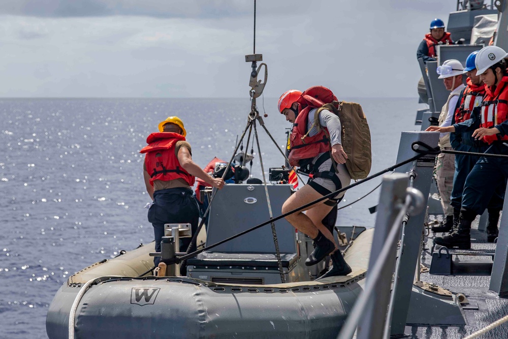 Sailors conduct small boat operations aboard USS Ralph Johnson (DDG 114), 29 June.