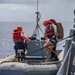 Sailors conduct small boat operations aboard USS Ralph Johnson (DDG 114), 29 June.