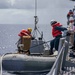 Sailors conduct small boat operations aboard USS Ralph Johnson (DDG 114), 29 June.