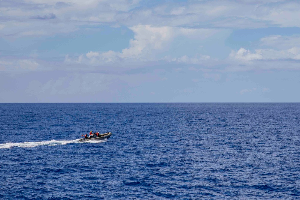 Sailors conduct small boat operations aboard USS Ralph Johnson (DDG 114), 29 June.