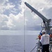 Sailors conduct small boat operations aboard USS Ralph Johnson (DDG 114), 29 June.
