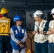 USS Robert Smalls (CG 62) Sailor converses with Philippine Navy sailor during UNREP