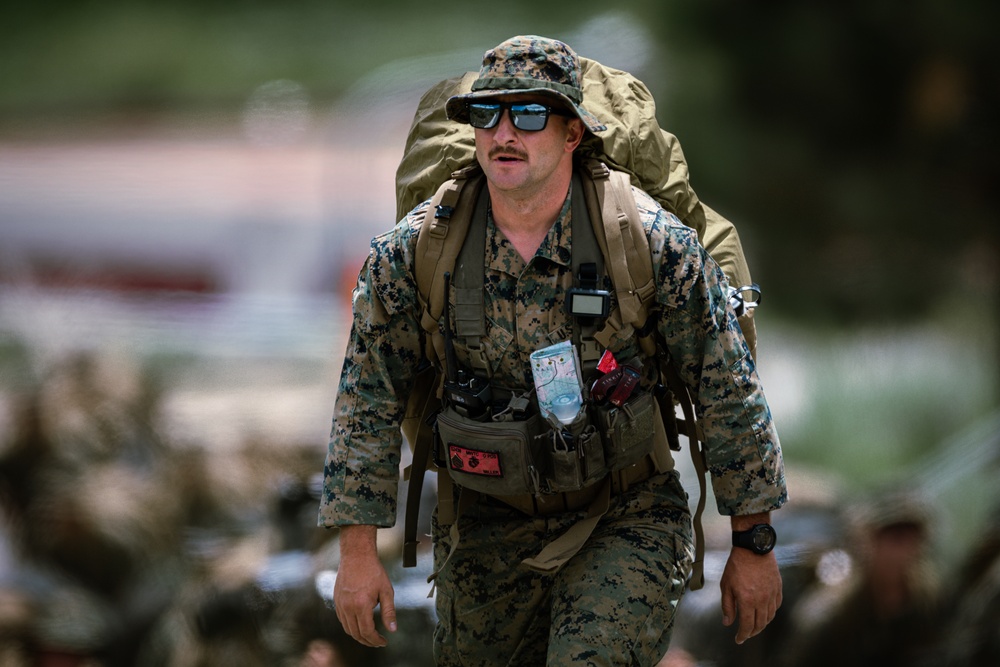 U.S. Marines with 2/23 conduct a conditioning hike during Mountain Exercise 4-23