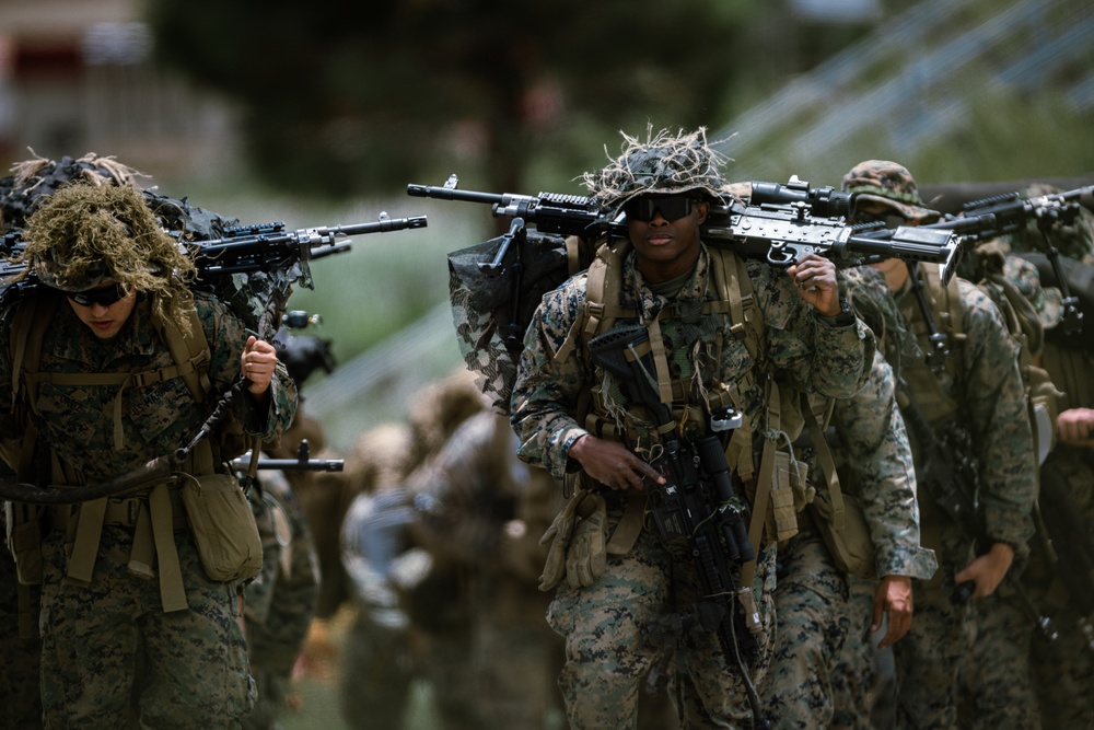 U.S. Marines with 2/23 conduct a conditioning hike during Mountain Exercise 4-23