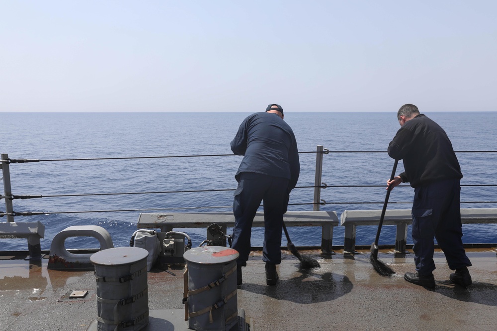 Sailors Sweeping The Deck