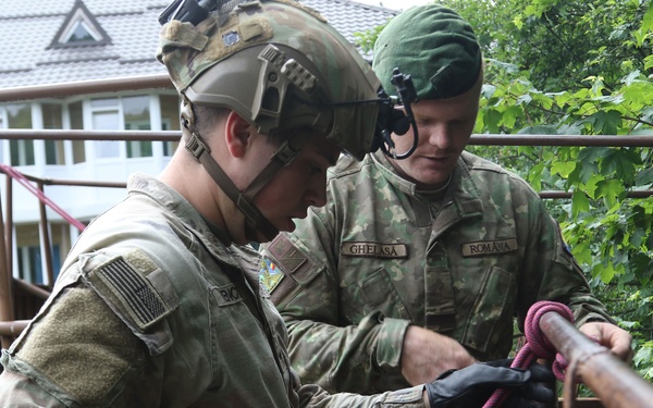 TF Mountain Soldiers are taught how to repel by Romanian Forces