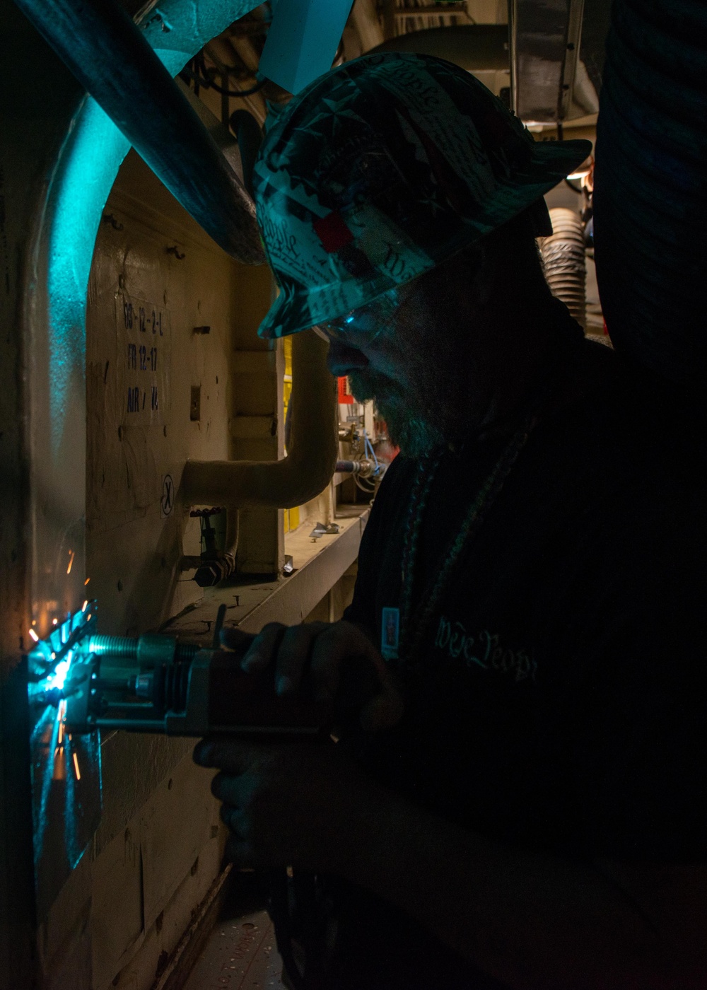 Contractor working onboard John C. Stennis