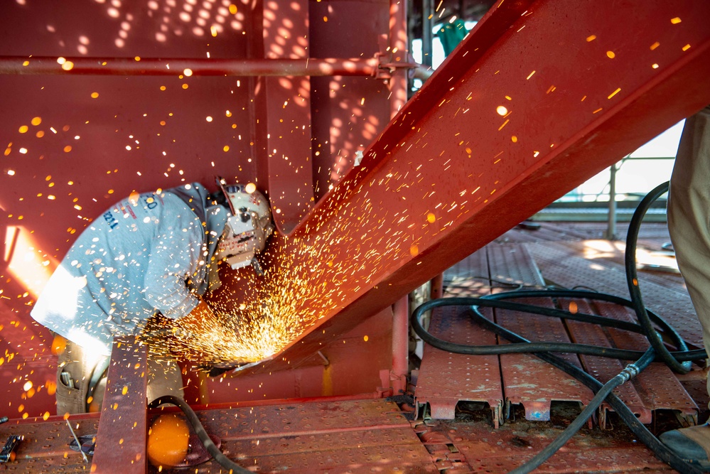 Contractor working onboard John C. Stennis