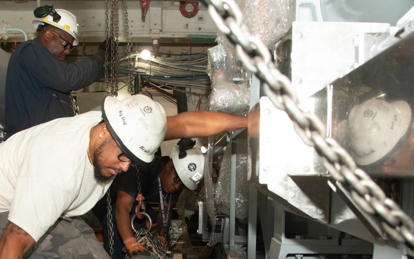 Contractors working onboard John C. Stennis