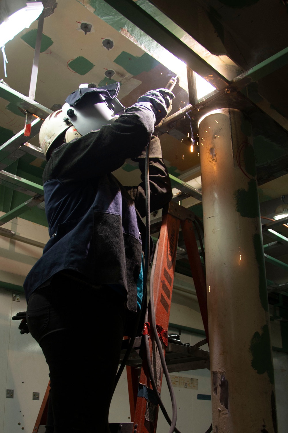 Contractor working onboard John C. Stennis