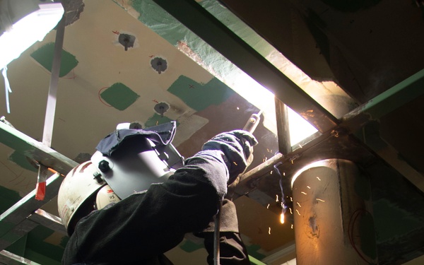 Contractor working onboard John C. Stennis
