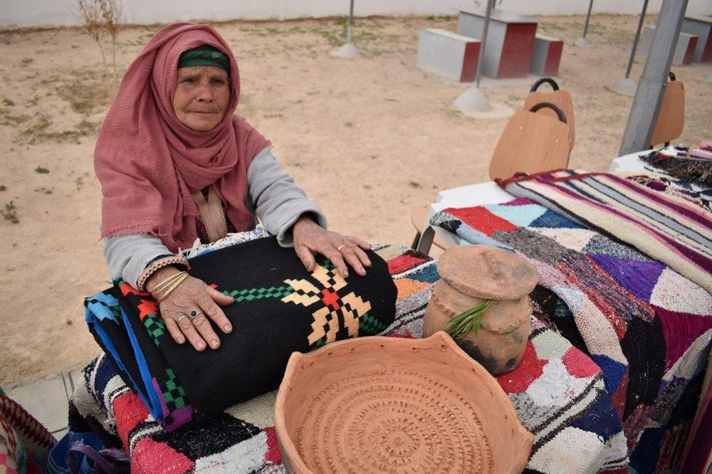 Women sell their handmade products at the USAID-supported Thelept Cultural Center Handicrafts Fair