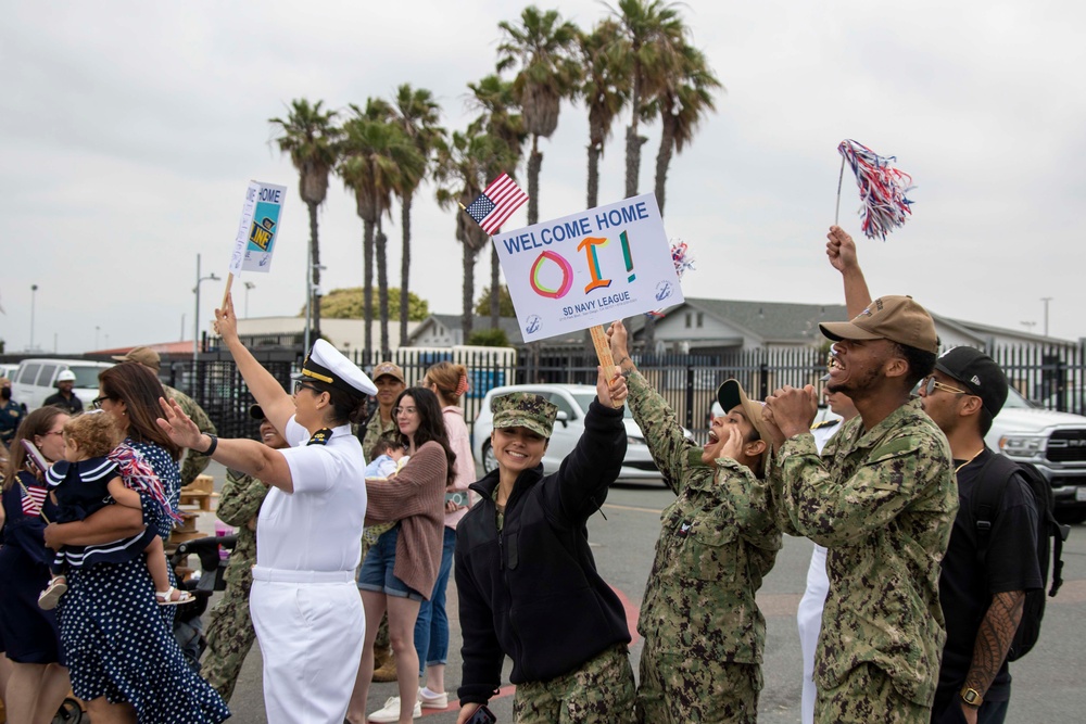 Family and Friends Wait to Greet USS Decatur Sailors Returning from Deployment