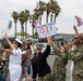 Family and Friends Wait to Greet USS Decatur Sailors Returning from Deployment