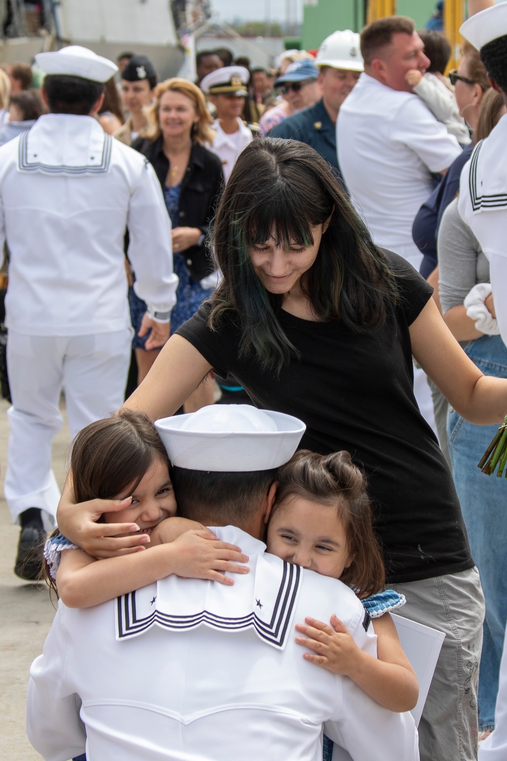 USS Decatur Sailor Hugs His Children After Returning from Deployment