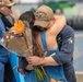 USS Decatur Sailor Embraces His Wife After Returning from Deployment