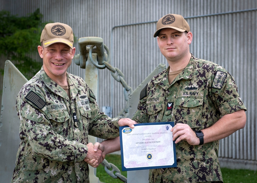 Reserve Sailor Receives NAMTS NEC Certificate