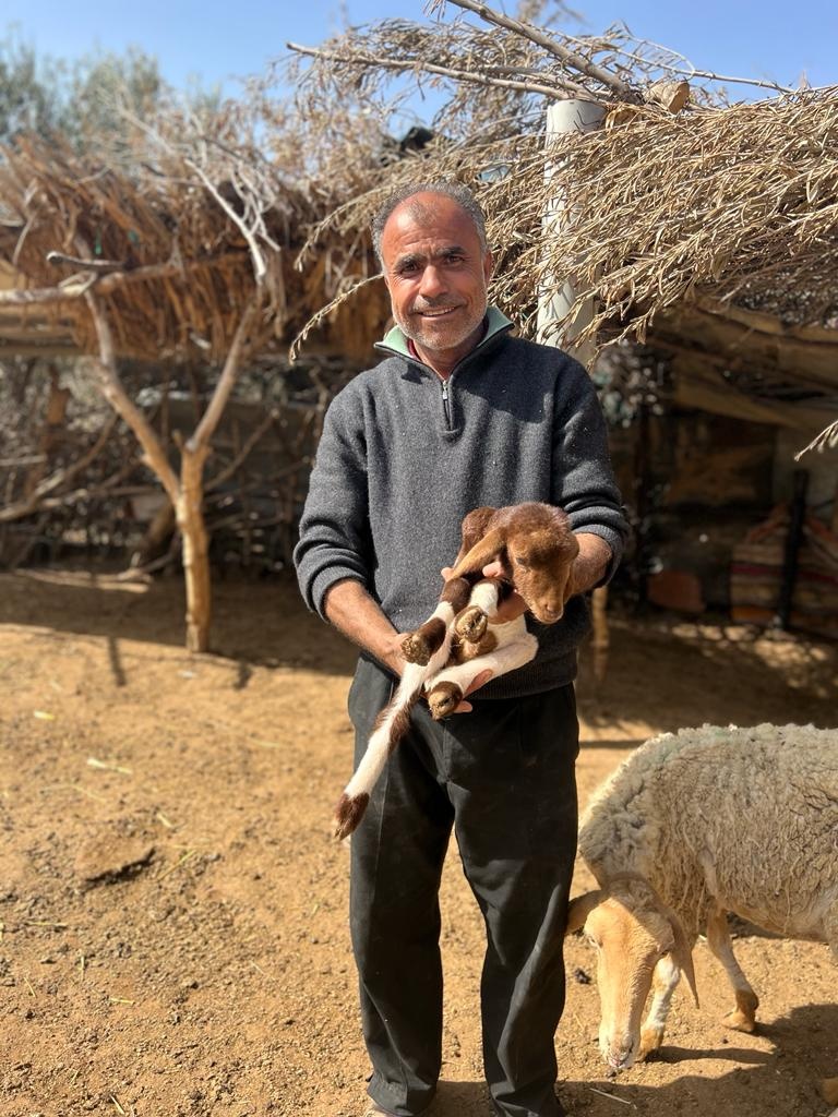 Farmer and his Goat at USAID-supported SMSA El Mouzeraa Agriculture Cooperative