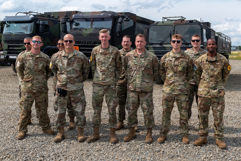U.S. Airmen pose for a photo at exercise Air Defender 2023