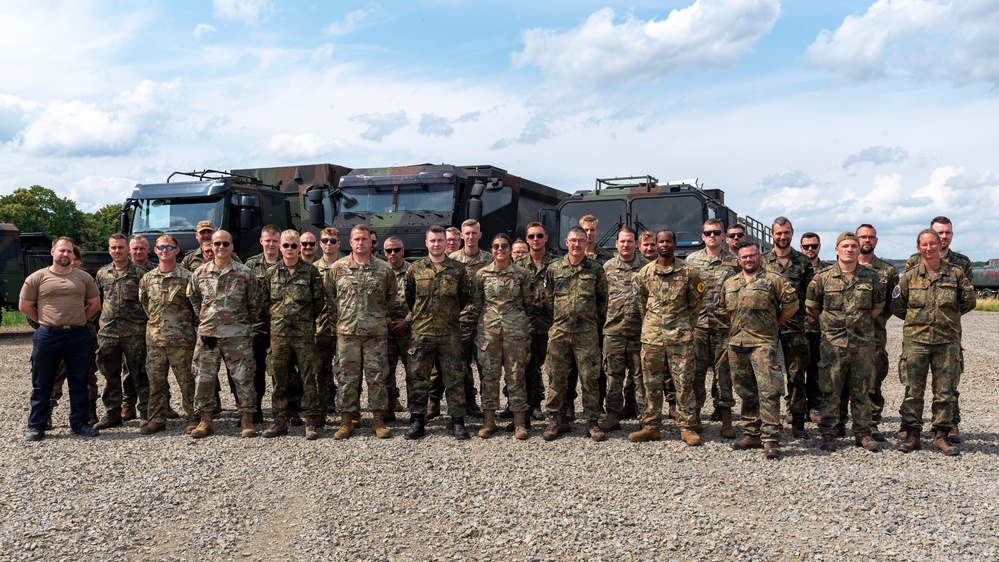 U.S. and German petroleum, oil, and lubricant specialist pose for a photo at exercise Air Defender 2023