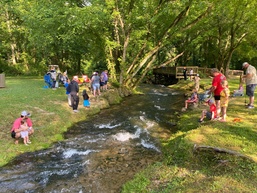 Hundreds of kids get hooked on stewardship at free fishing rodeo