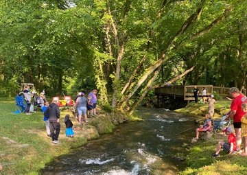Hundreds of kids get hooked on stewardship at free fishing rodeo