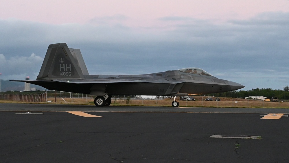 When Darkness Meets Power: Hawaii F-22s Chase the Sunset