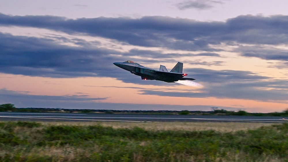 When Darkness Meets Power: Hawaii F-22s Chase the Sunset