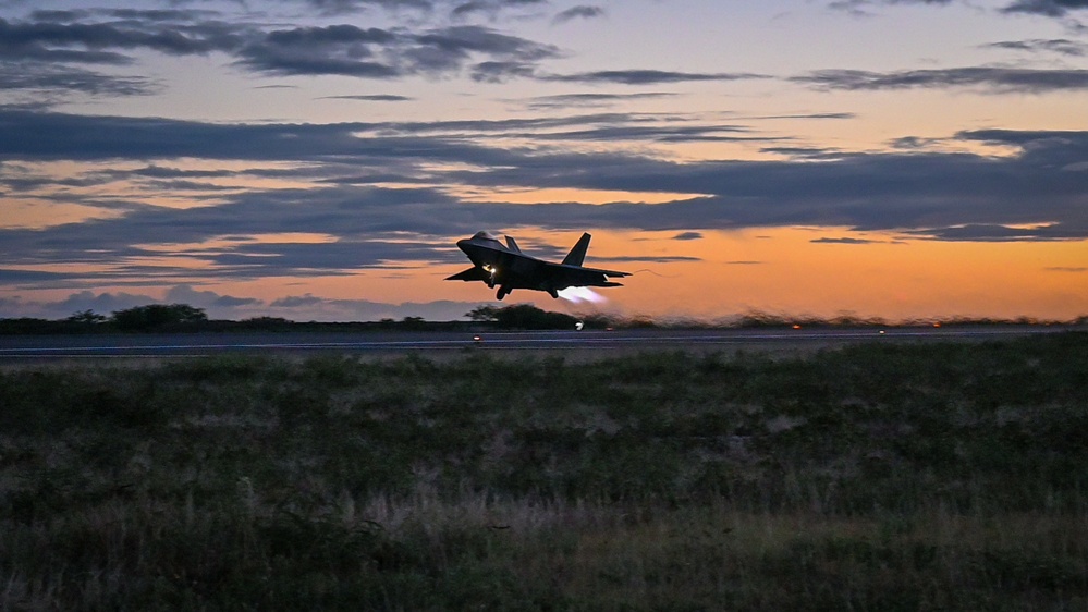 When Darkness Meets Power: Hawaii F-22s Chase the Sunset