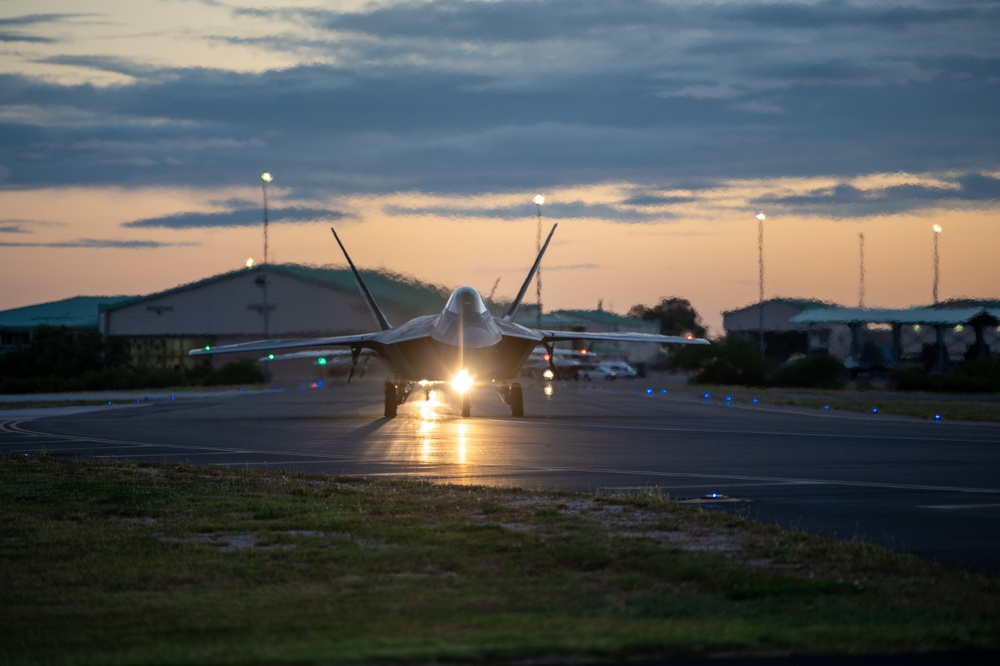 When Darkness Meets Power: Hawaii F-22s Chase the Sunset