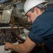 USS Ronald Reagan (CVN 76) Sailors maintain aircraft towing tractors