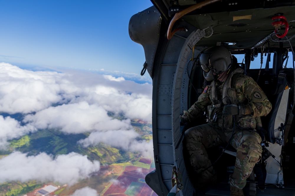 Soldiers fly in UH-60 Blackhawk in Hawaii