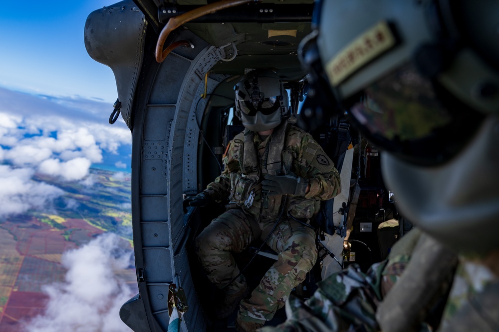 Soldiers fly in UH-60 Blackhawk in Hawaii