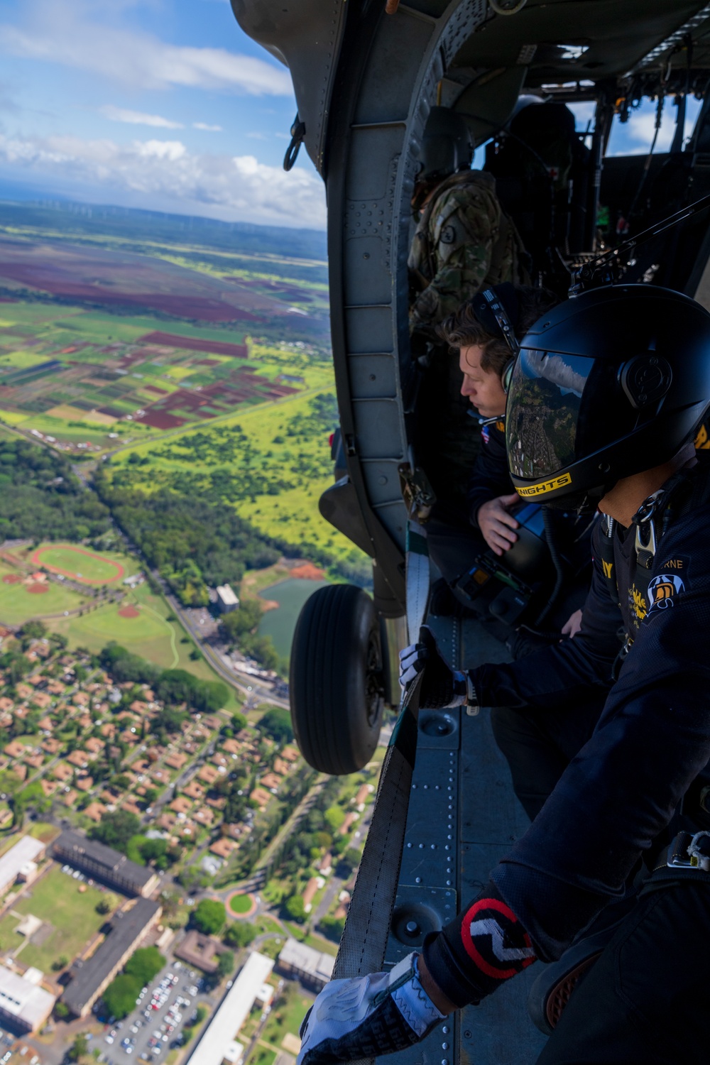 Army Golden Knights jump from UH-60 Blackhawk in Hawaii ahead of Independence Day festivities