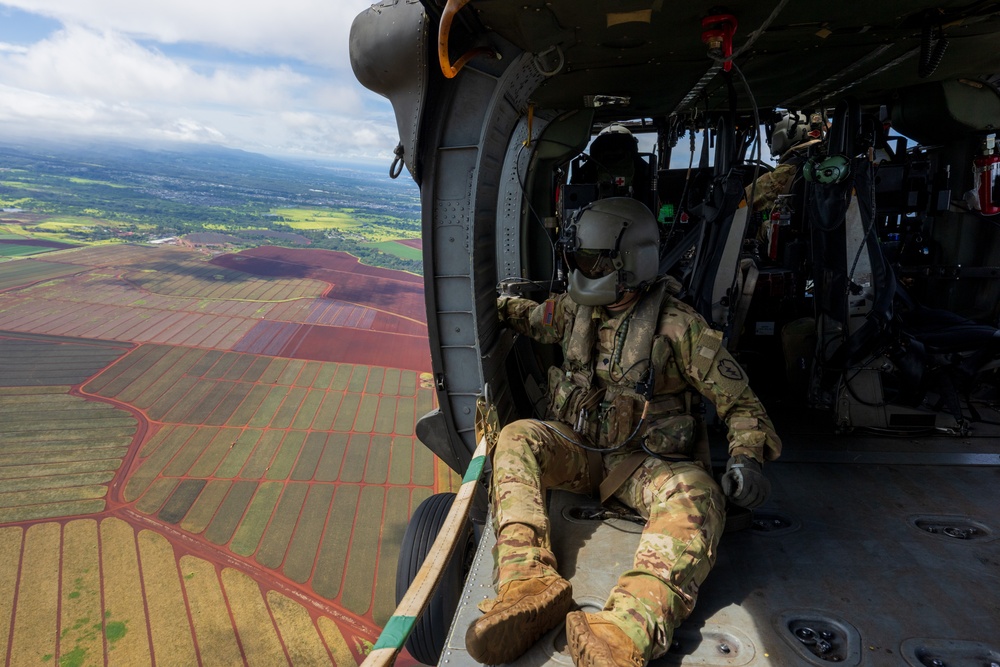 Soldiers fly in UH-60 Blackhawk in Hawaii