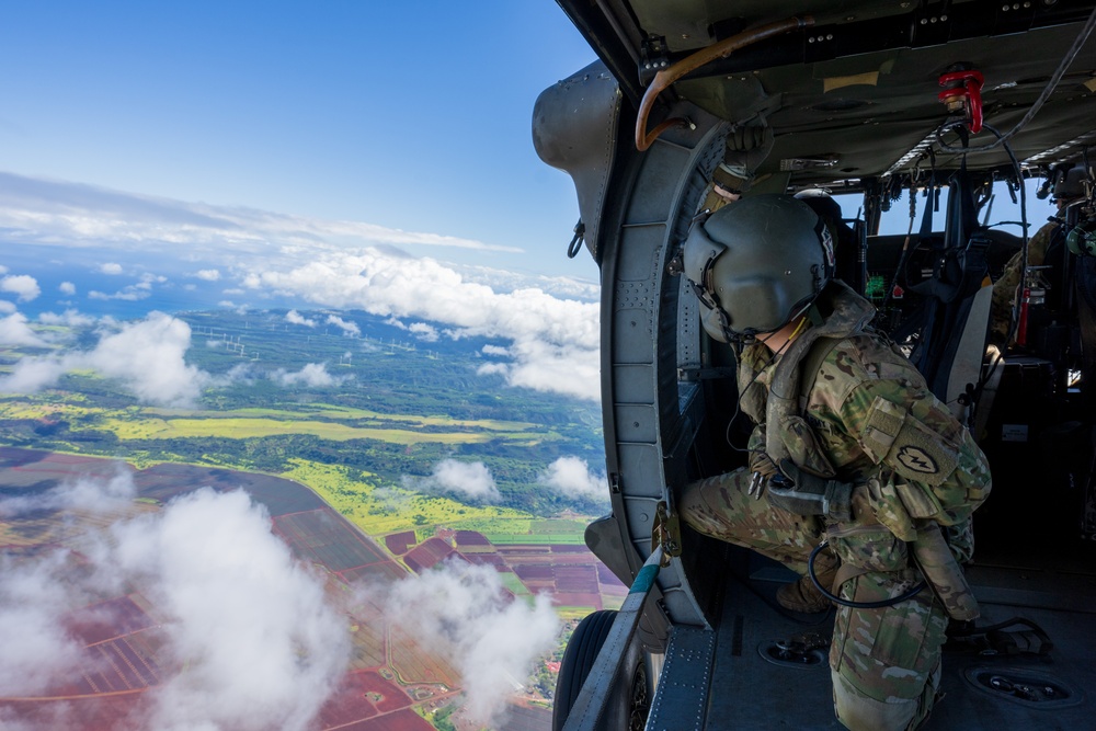 Soldiers fly in UH-60 Blackhawk in Hawaii