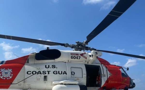 Coast Guard MH-60 Jayhawk helicopter sits on board offshore platform