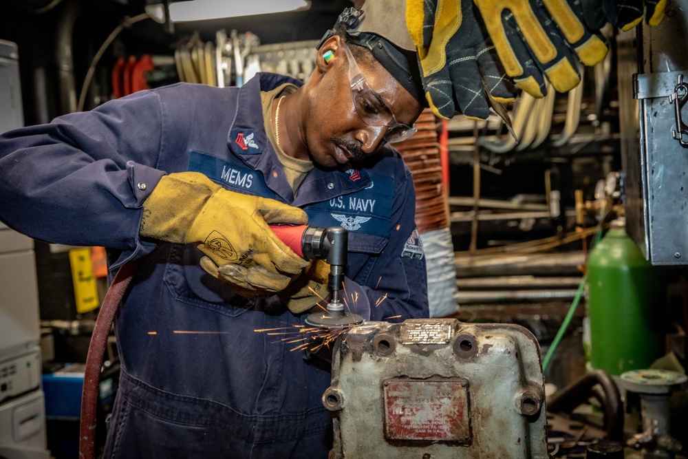 USS McFaul Hull Technician Conducts Maintenance