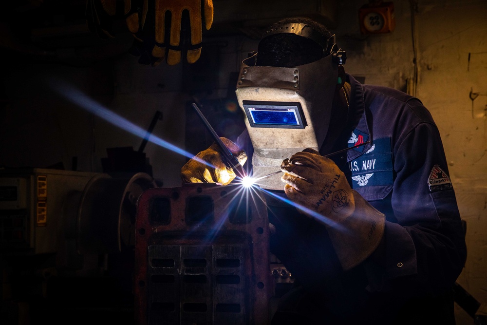 USS McFaul Hull Technician Conducts Maintenance