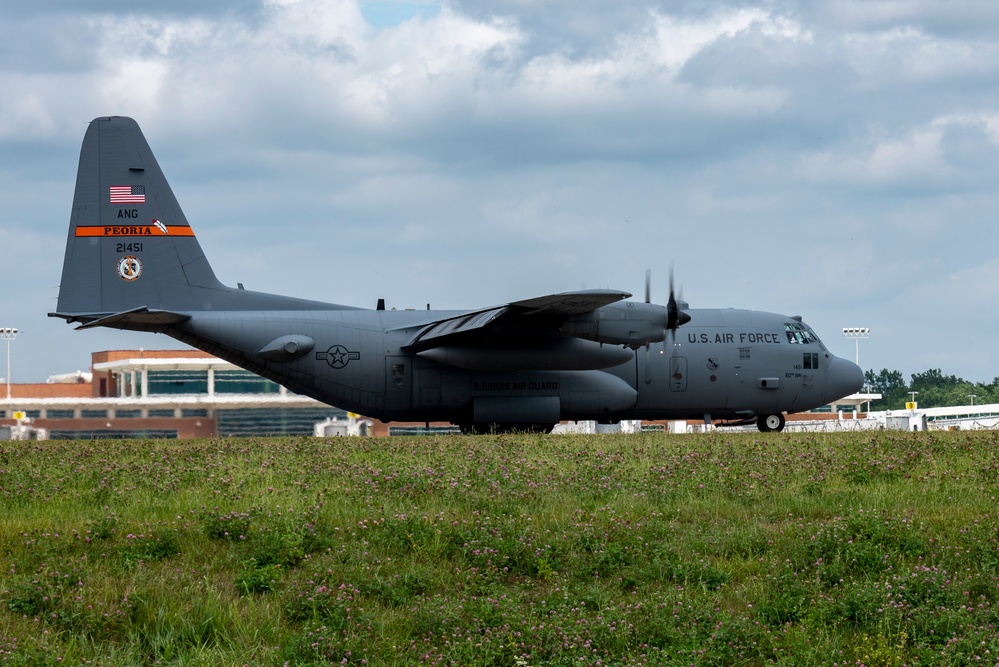 U.S. Airmen with the 182nd Airlift Wing return to Peoria from exercise Air Defender 2023