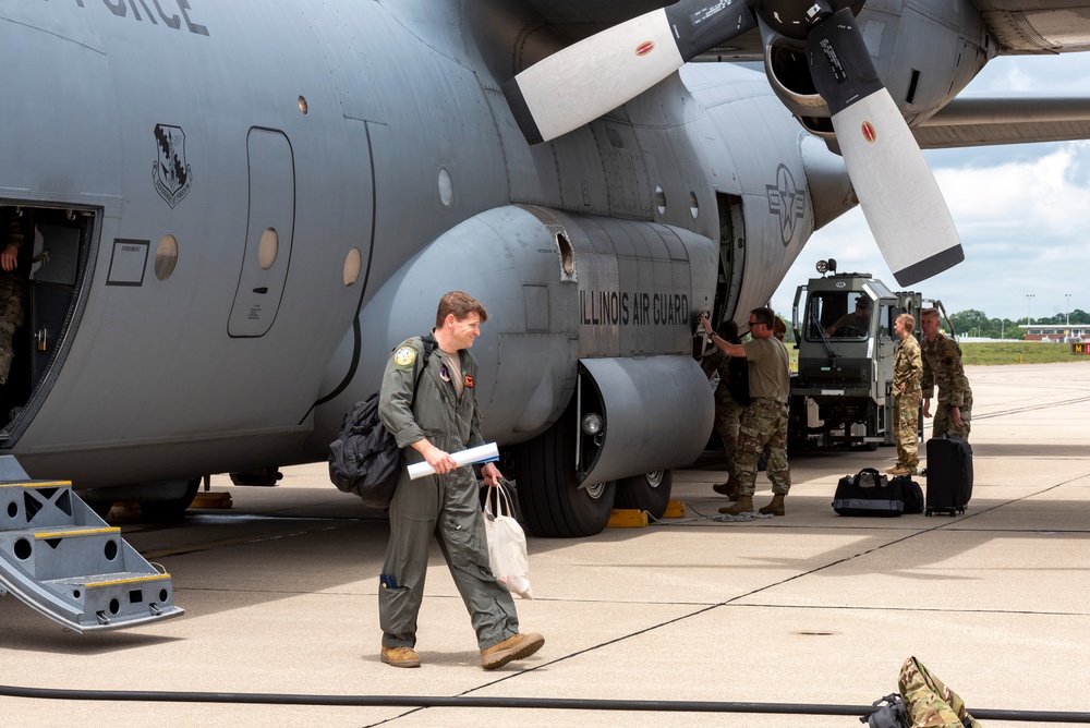 U.S. Airmen with the 182nd Airlift Wing return to Peoria from exercise Air Defender 2023