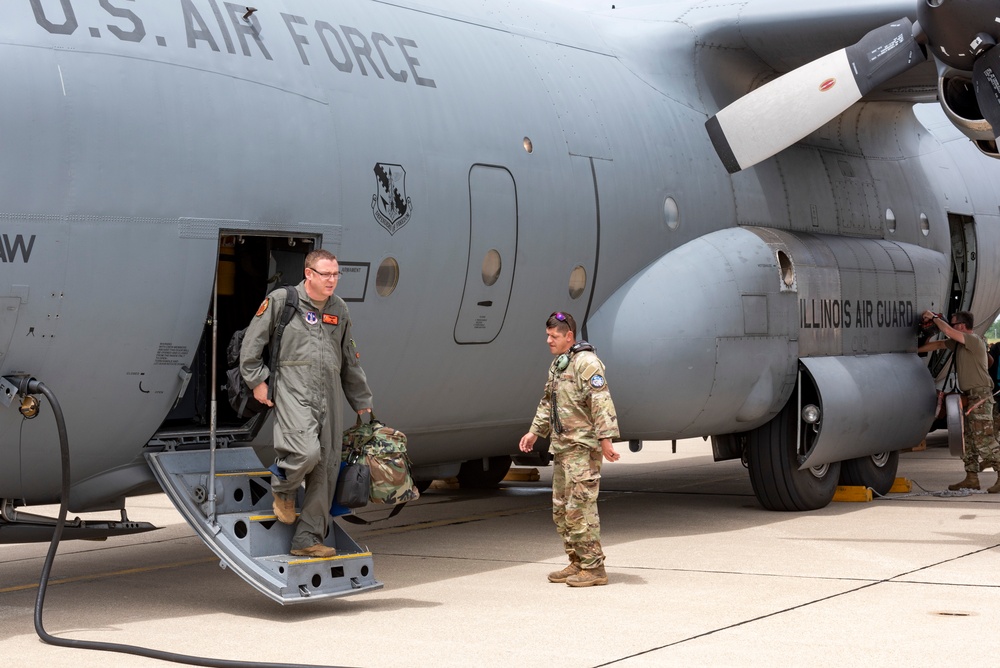 U.S. Airmen with the 182nd Airlift Wing return to Peoria from exercise Air Defender 2023