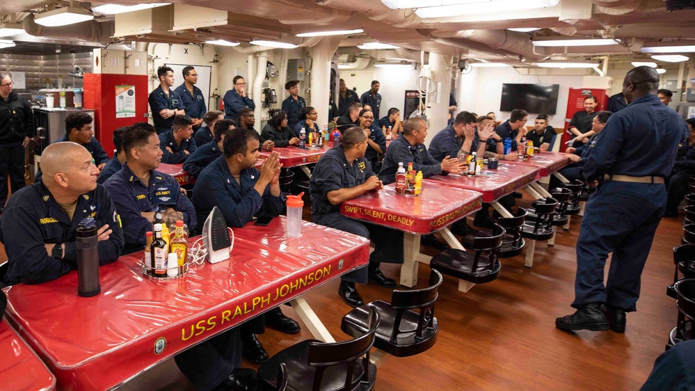 Sailors celebrate Pride Month aboard USS Ralph Johnson (DDG 114), 30 June.