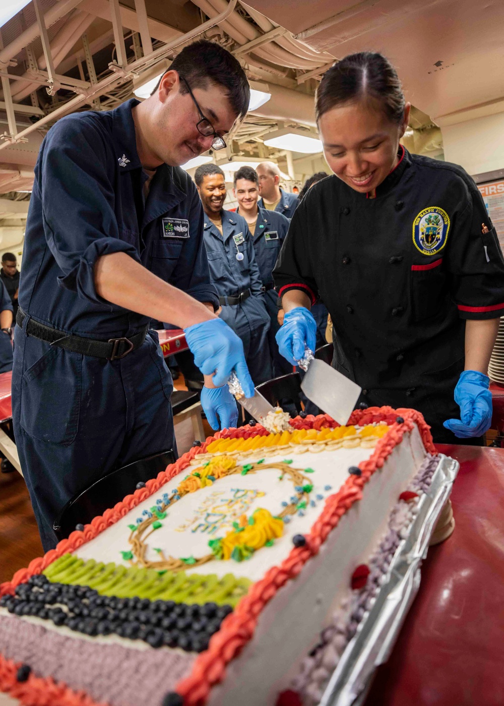 Sailors celebrate Pride Month aboard USS Ralph Johnson (DDG 114), 30 June.