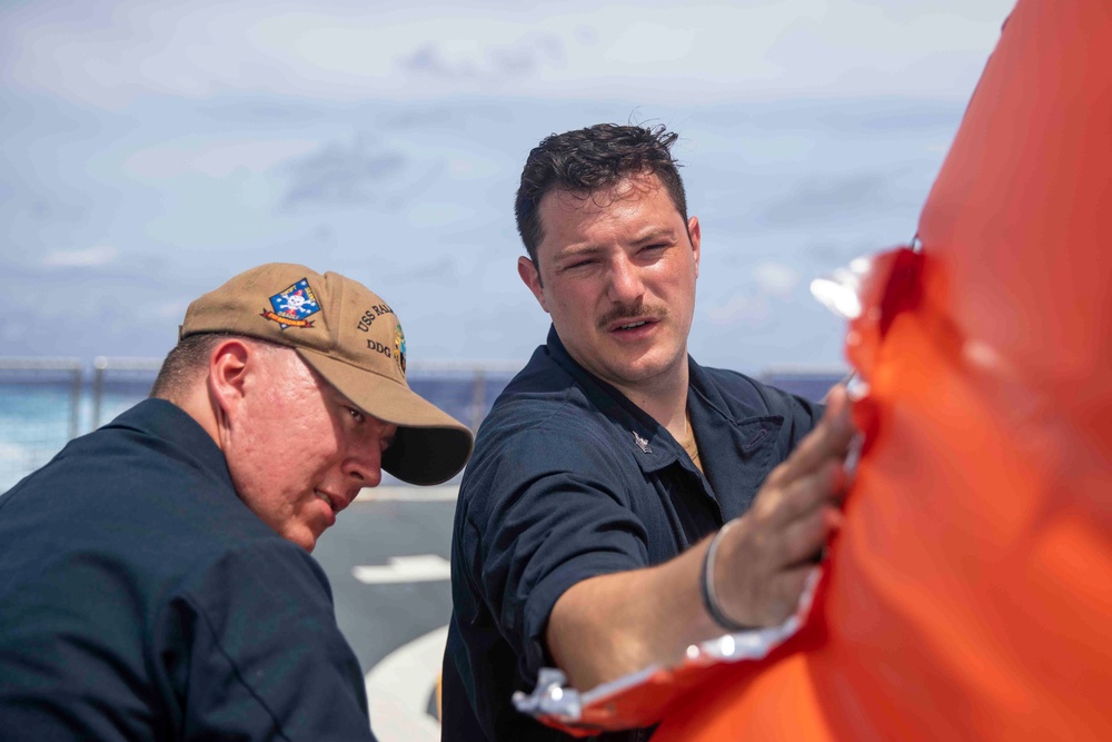 Arleigh Burke-class guided-missile destroyer USS Ralph Johnson (DDG 114) conducts a live fire exercise in the Philippine Sea, July 1.