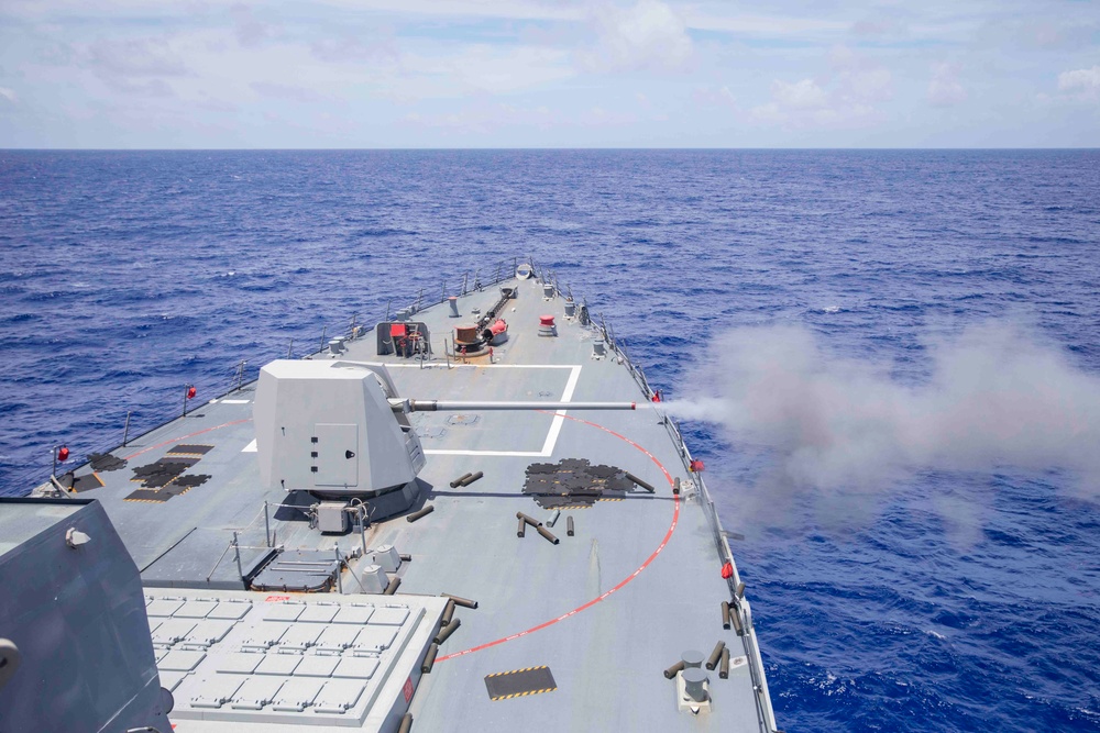 Arleigh Burke-class guided-missile destroyer USS Ralph Johnson (DDG 114) conducts a live fire exercise in the Philippine Sea, July 1.