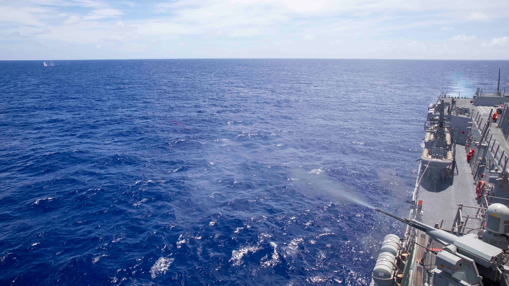 Arleigh Burke-class guided-missile destroyer USS Ralph Johnson (DDG 114) conducts a live fire exercise in the Philippine Sea, July 1.